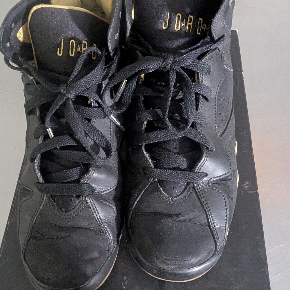 Jordan Air 7 Retro Black and Gold Sneakers